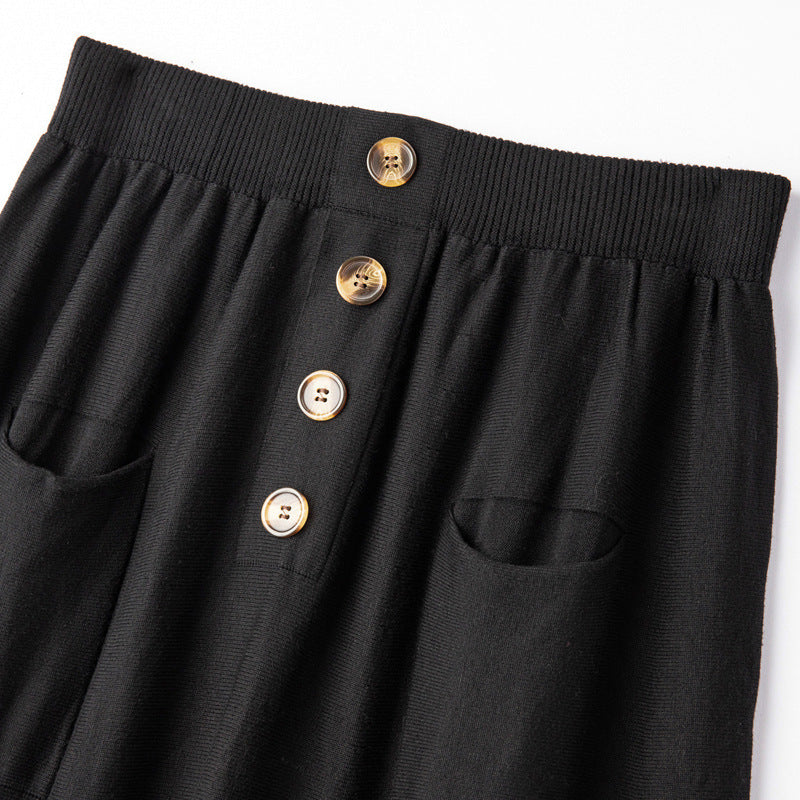 Women's midi skirt made of wool blend with A-line, elastic ribbed waistband, decorative button placket, and patch pockets Mune Fashion
