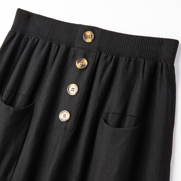 Women's midi skirt made of wool blend with A-line, elastic ribbed waistband, decorative button placket, and patch pockets Mune Fashion