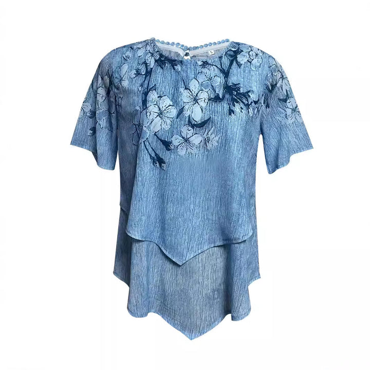Women's two-layer blouse dress with asymmetrical tiered hem, floral print yoke, and wing sleeves Mune Fashion