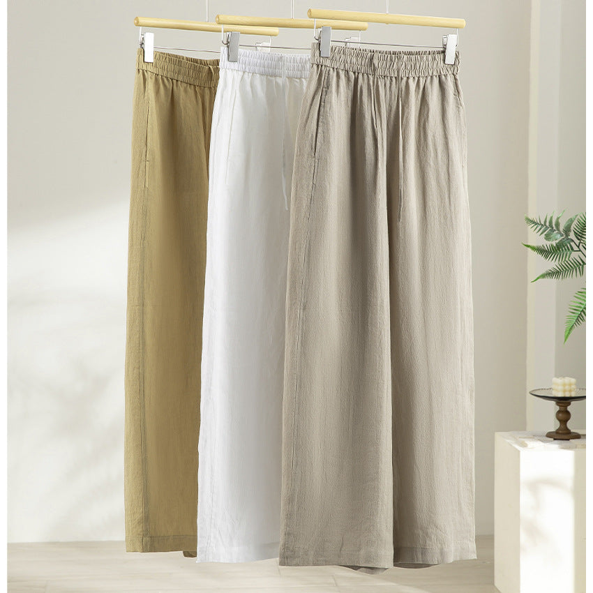 Women's wide linen look trousers with high elastic waistband and flowing wide leg silhouette Mune Fashion