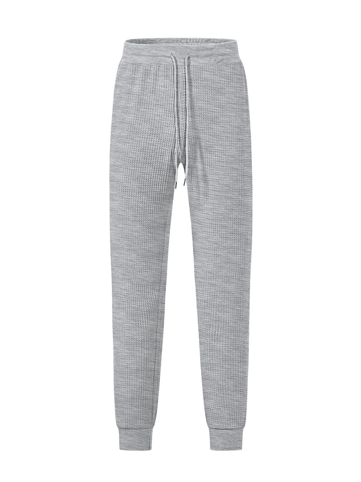 Men's fine-structured jersey lounge pants tapered cut with drawstring waistband and ribbed leg openings Mune Fashion