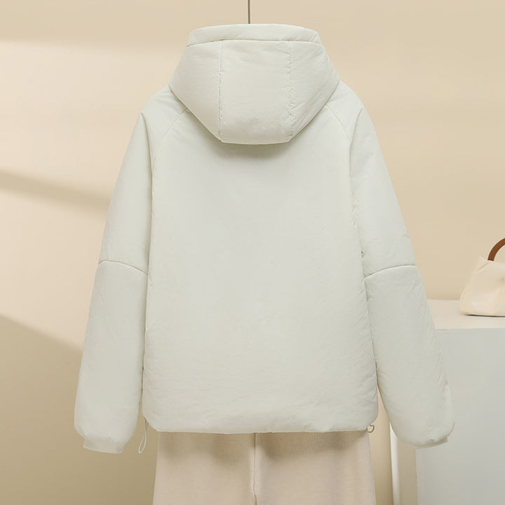 Women's quilted hooded jacket with short boxy cut, adjustable hem, and warming padding Mune Fashion