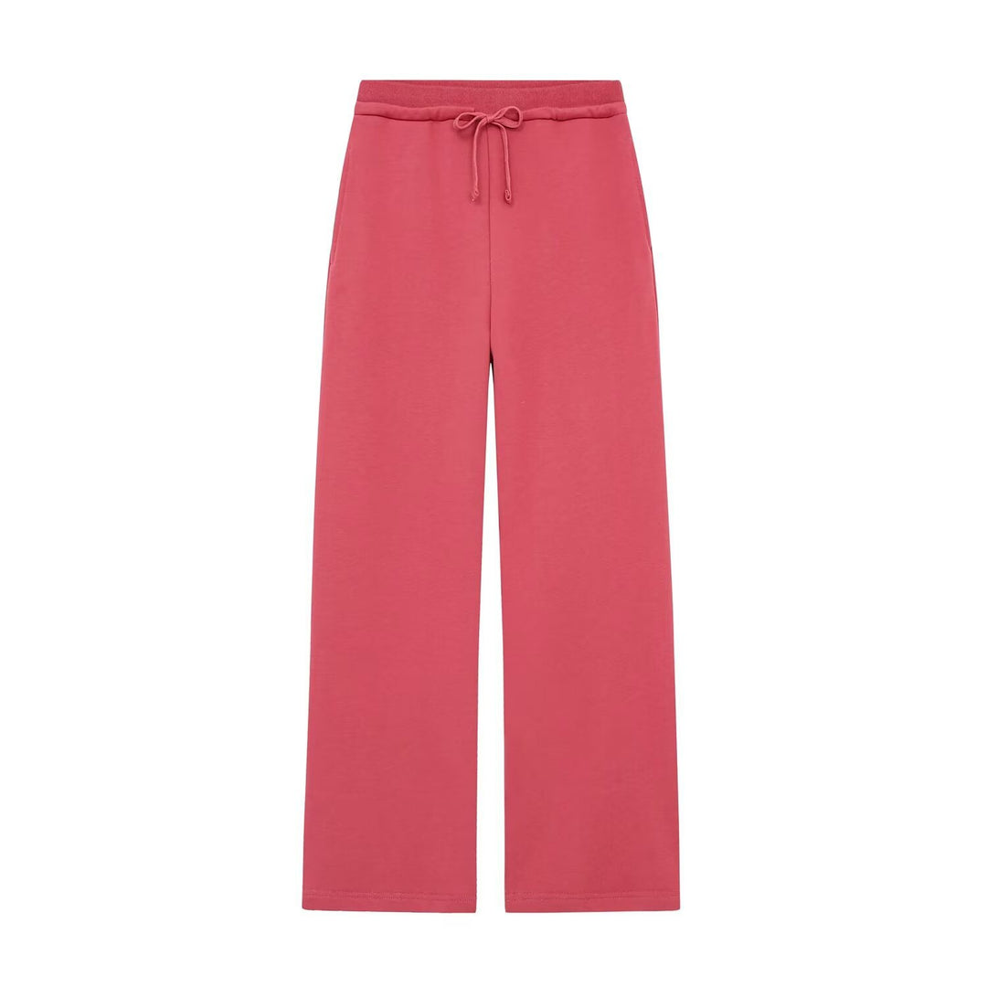 Women's wide high-waist palazzo pants with elastic waistband and flowing silhouette Mune Fashion