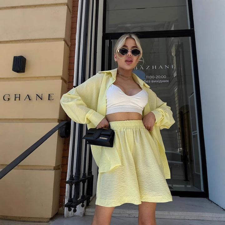 Women's two-piece textured loungewear set with oversized shirt and elastic waist shorts Mune Fashion