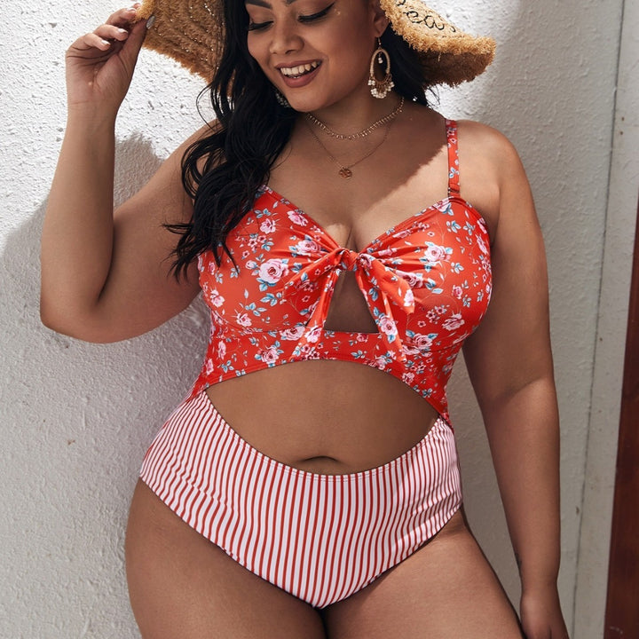 Women's bikini set with playful floral top and striped bottom Mune Fashion