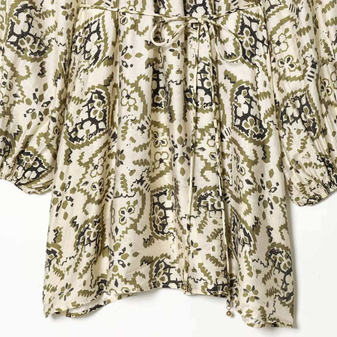 Women’s airy pleated dress with a Carmen collar, wide balloon sleeves, and adjustable drawstring Mune Fashion
