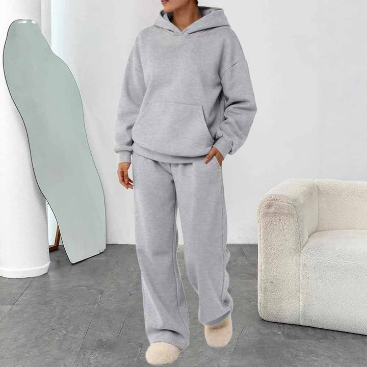 Women's two-piece leisure lounge set with hoodie, kangaroo pocket, and straight lounge pants made of soft cotton blend Mune Fashion
