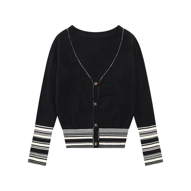 Ladies cardigan with V-neck, fine jacquard pattern and contrasting cuffs Mune Fashion