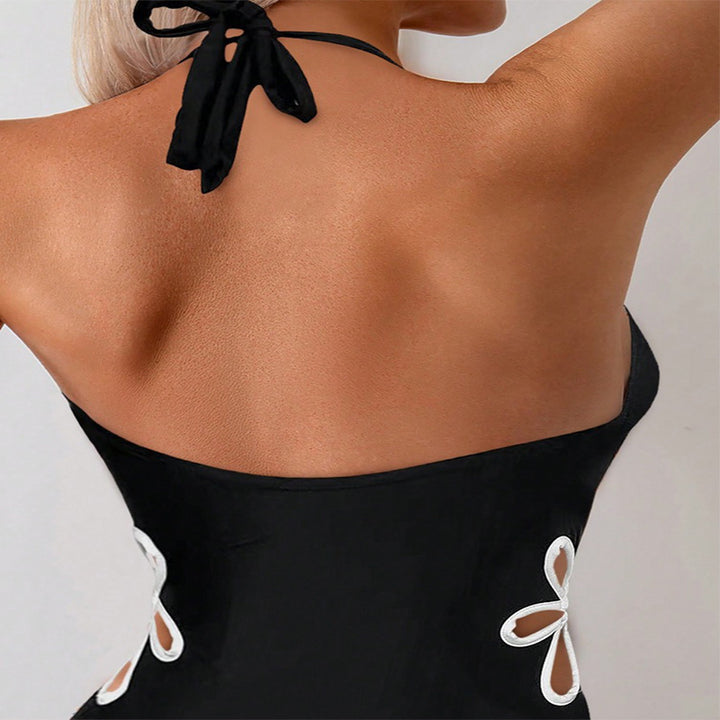 Women's one-piece swimsuit with deep V-neckline and floral cut-out details Mune Fashion