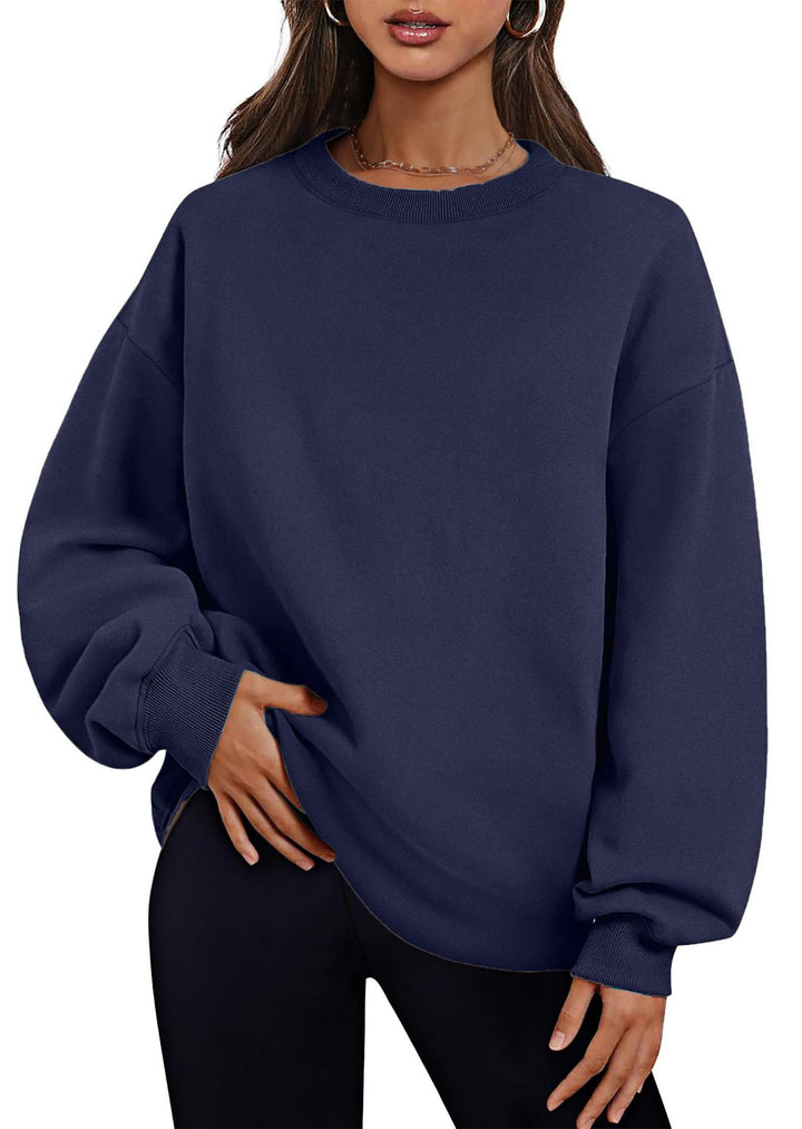 Women's extended oversized round neck sweater with side pockets, ribbed cuffs, and dropped shoulder Mune Fashion