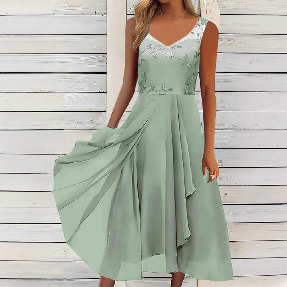 Women A-line chiffon dress with floral embroidered bodice, V-neck, draped godet swing and concealed side pockets Mune Fashion