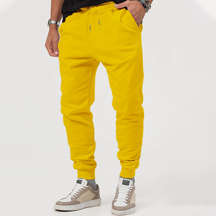 Men's jersey sweatpants in a tapered cut with concealed drawstring and shape-stable ankle cuffs Mune Fashion