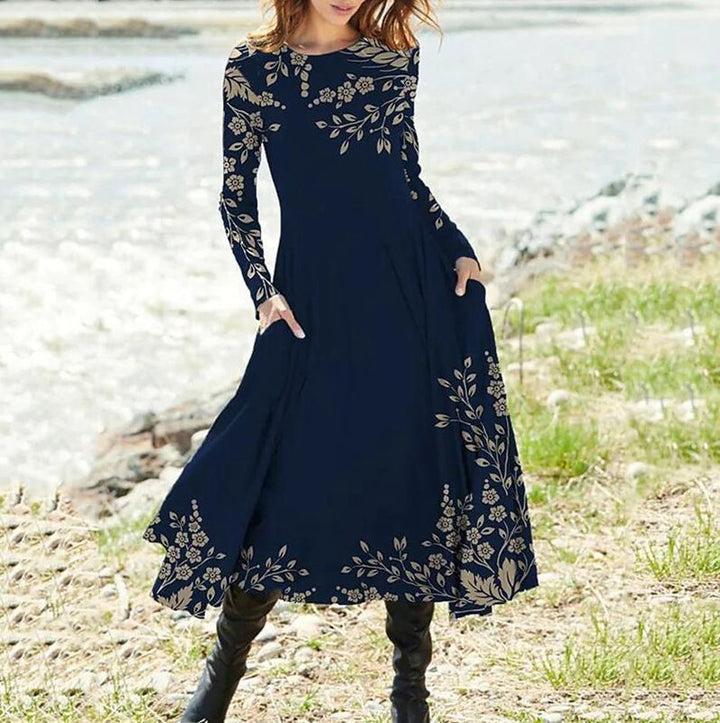 Women's Boho Maxi Dress with tailored empire waist, long sleeves, and side pockets Mune Fashion