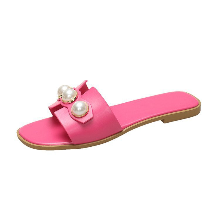Ladies' flat slide sandal with large decorative pearls and gold-trimmed applications padded comfort footbed Mune Fashion