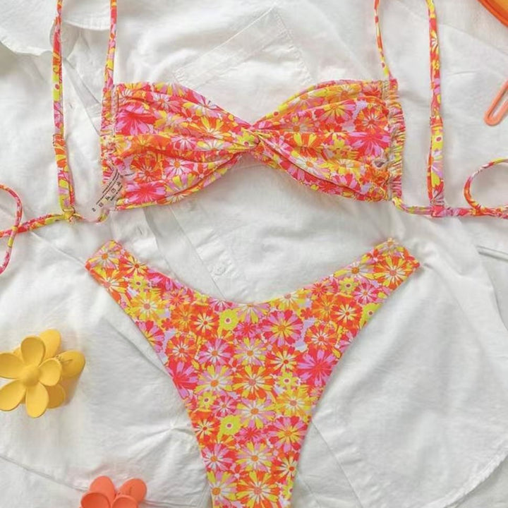 Women's triangle bikini with floral design and playful ruffle details Mune Fashion