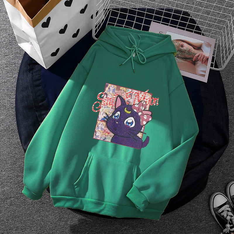 Women's oversized hoodie with shimmering anime cat motif, kangaroo pocket, and soft fleece lining Mune Fashion