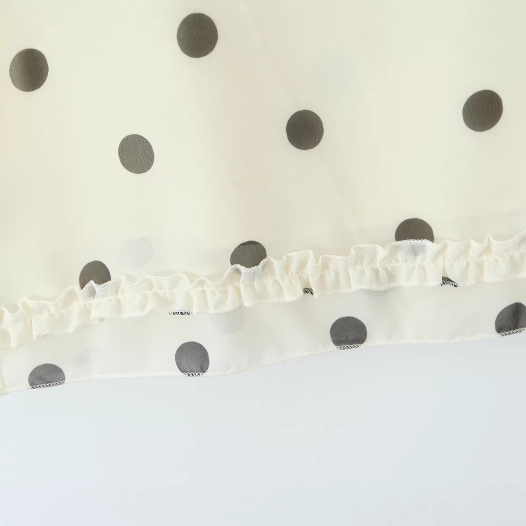 Women's midi skirt made of flowing chiffon with polka dots and ruffle trim Mune Fashion
