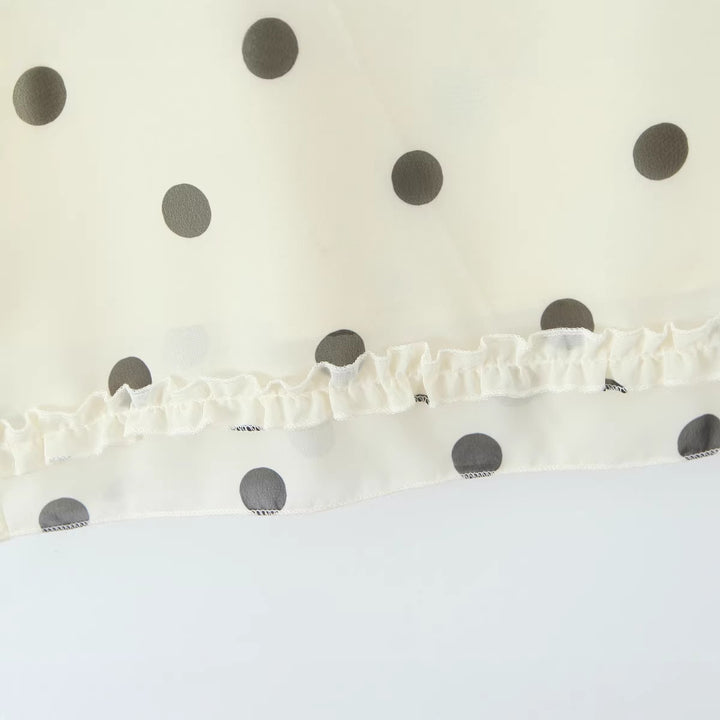 Women's midi skirt made of flowing chiffon with polka dots and ruffle trim Mune Fashion