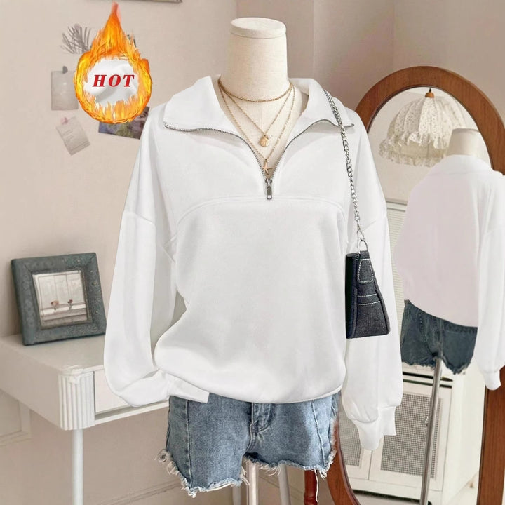 Women's oversized sweatshirt with half zipper, high collar and balloon sleeves Mune Fashion
