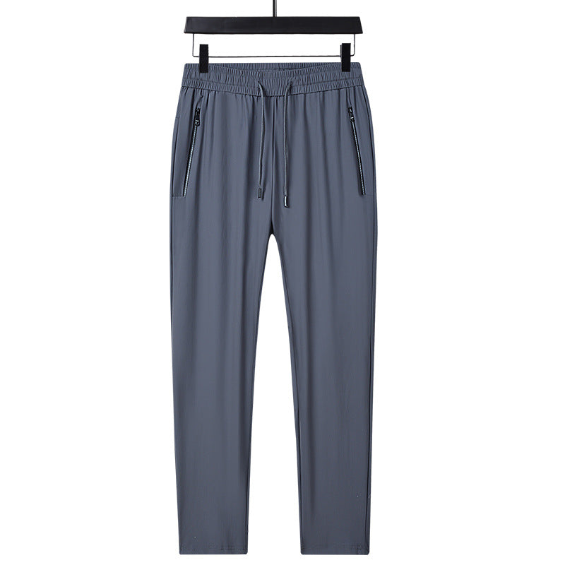 Men's sporty training pants with functional zippered pockets Mune Fashion