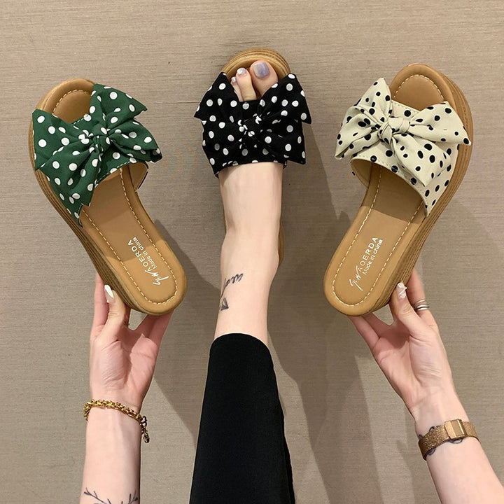 Ladies nan wedge slide with stacked platform sole, padded comfort footbed and decorative bow Mune Fashion