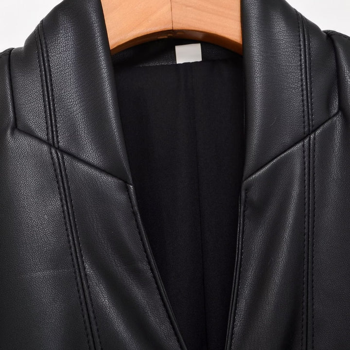 Women's tailored double-breasted faux leather midi coat with shawl collar and patch pockets Mune Fashion