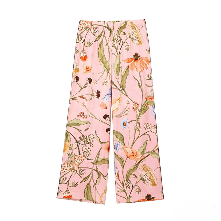 Women's wide high-waisted satin pants with floral all-over print and elastic waistband Mune Fashion