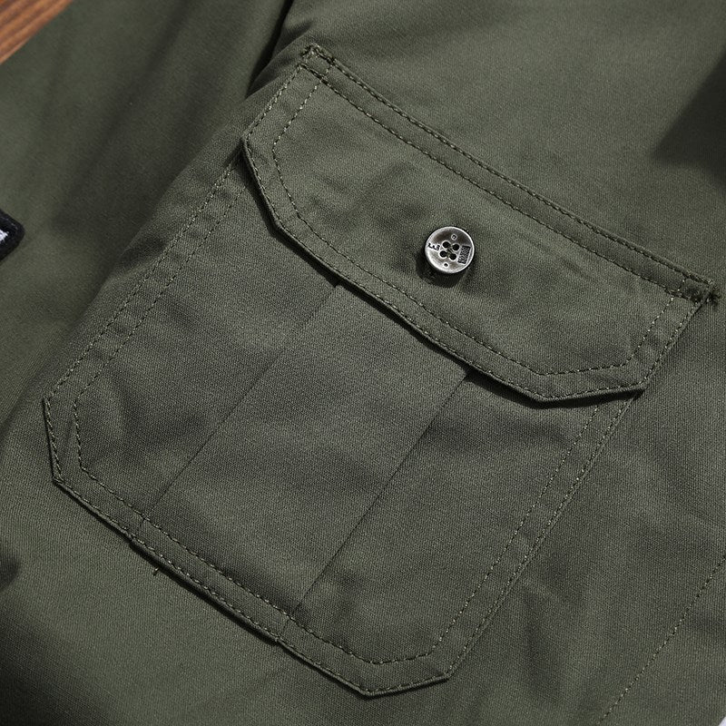 Men's utility shirt jacket with chest pockets, shoulder epaulettes, and badge applications Mune Fashion