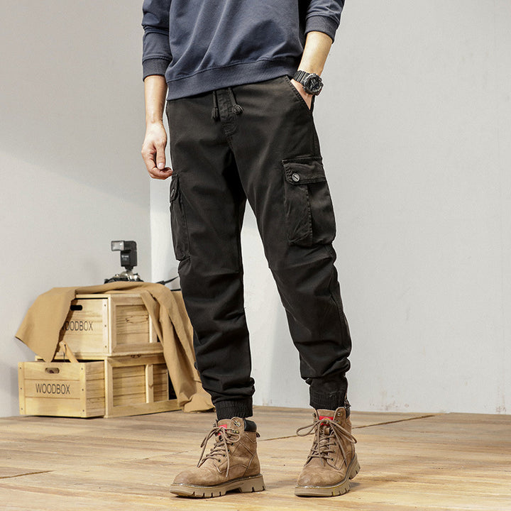 Men's robustly cut canvas cargo jogging pants with drawstring waist, knee patches, and elastic ankle cuffs Mune Fashion