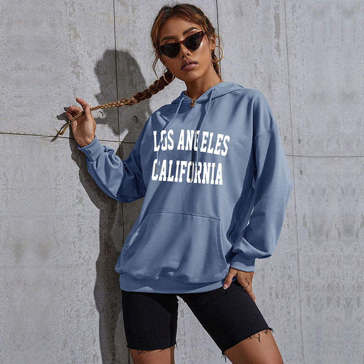 Women's oversized hoodie in collegiate style with kangaroo pocket, retro logo print, and French terry lining Mune Fashion