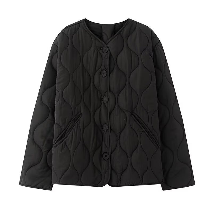 Women's quilted jacket without collar with round neckline, boxy cut and decorative wave quilting Mune Fashion