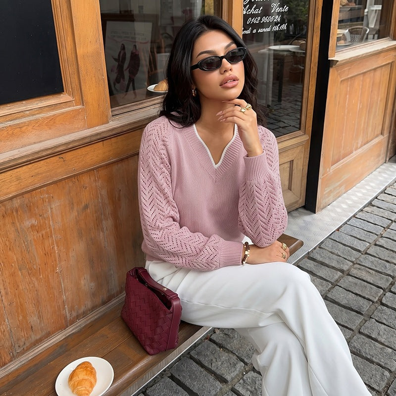 Women's fine knit sweater with deep V-neck, openwork sleeves, and ribbed hem Mune Fashion