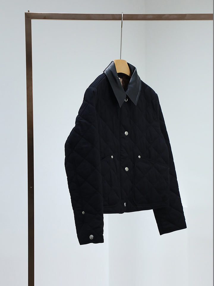 Women's quilted jacket with contrasting faux leather collar and boxy cut Mune Fashion