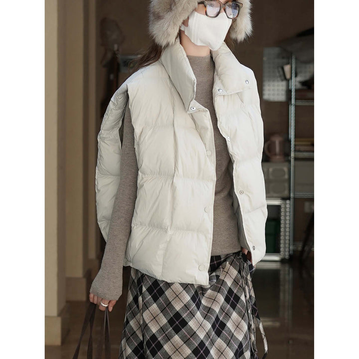 Women's lightweight quilted vest with high collar and snap button placket Mune Fashion