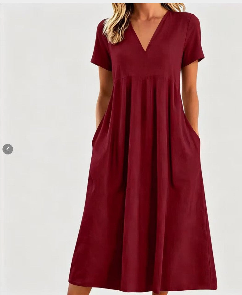 Women nan legeres V-neck midi dress with side pockets and gathered empire seam Mune Fashion