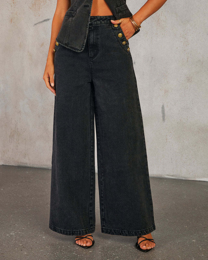 Women's loosely cut high-waisted denim pants with side button placket and wide leg Mune Fashion