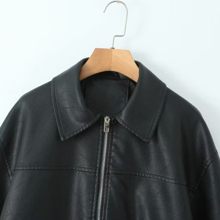 Women's oversized faux leather bomber jacket with shirt collar, elastic hem, and patch pockets Mune Fashion