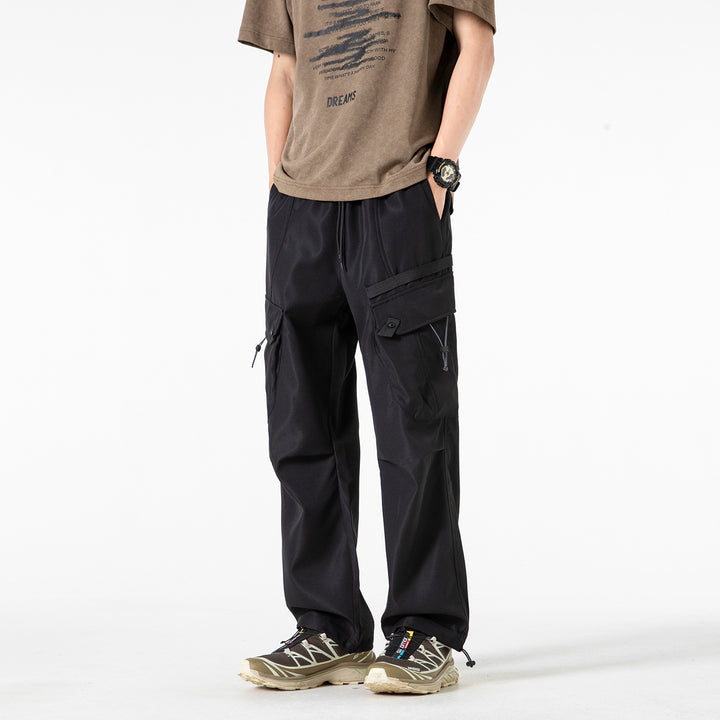 Men's Wide Utility Cargo Pants with Drawstring Waist, Multiple Pockets, and Adjustable Leg Openings Drune