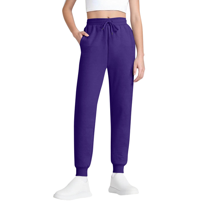 Women's slim high-waisted joggers with drawstring, side pockets, and cuffs Mune Fashion