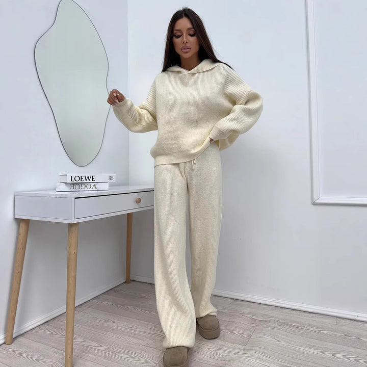 Women's elegant cashmere-like knit set with asymmetric waterfall collar and flowing palazzo knit trousers Mune Fashion