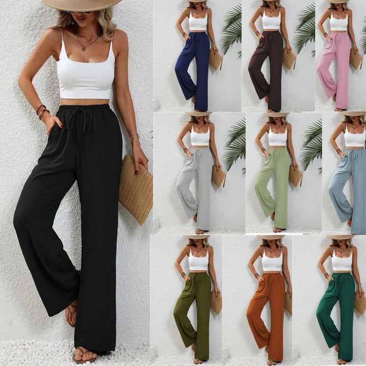 Ladies lightweight, loose-fitting beach pants with elastic waistband, drawstring and side pockets Mune Fashion
