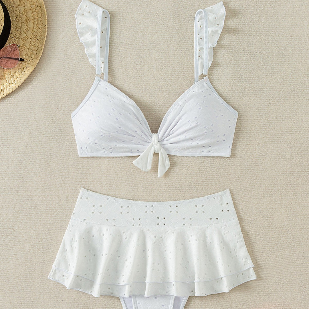 Ladies Top-Bikini with ruffle details and button-decorated bow Mune Fashion