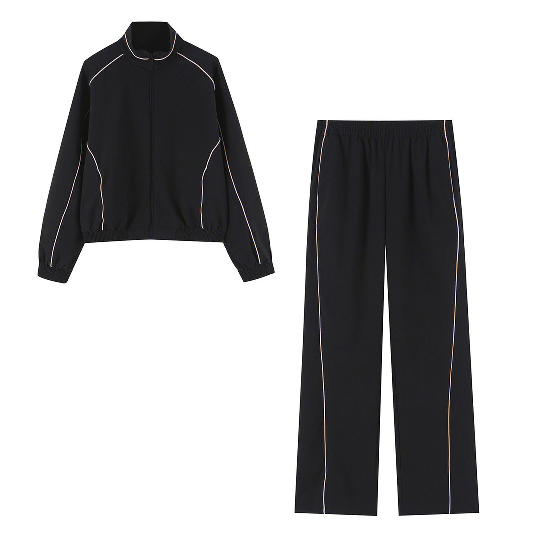 Women wide training pants with contrasting piping and elastic waistband Mune Fashion