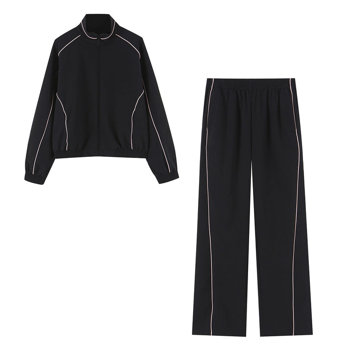 Women wide training pants with contrasting piping and elastic waistband Mune Fashion