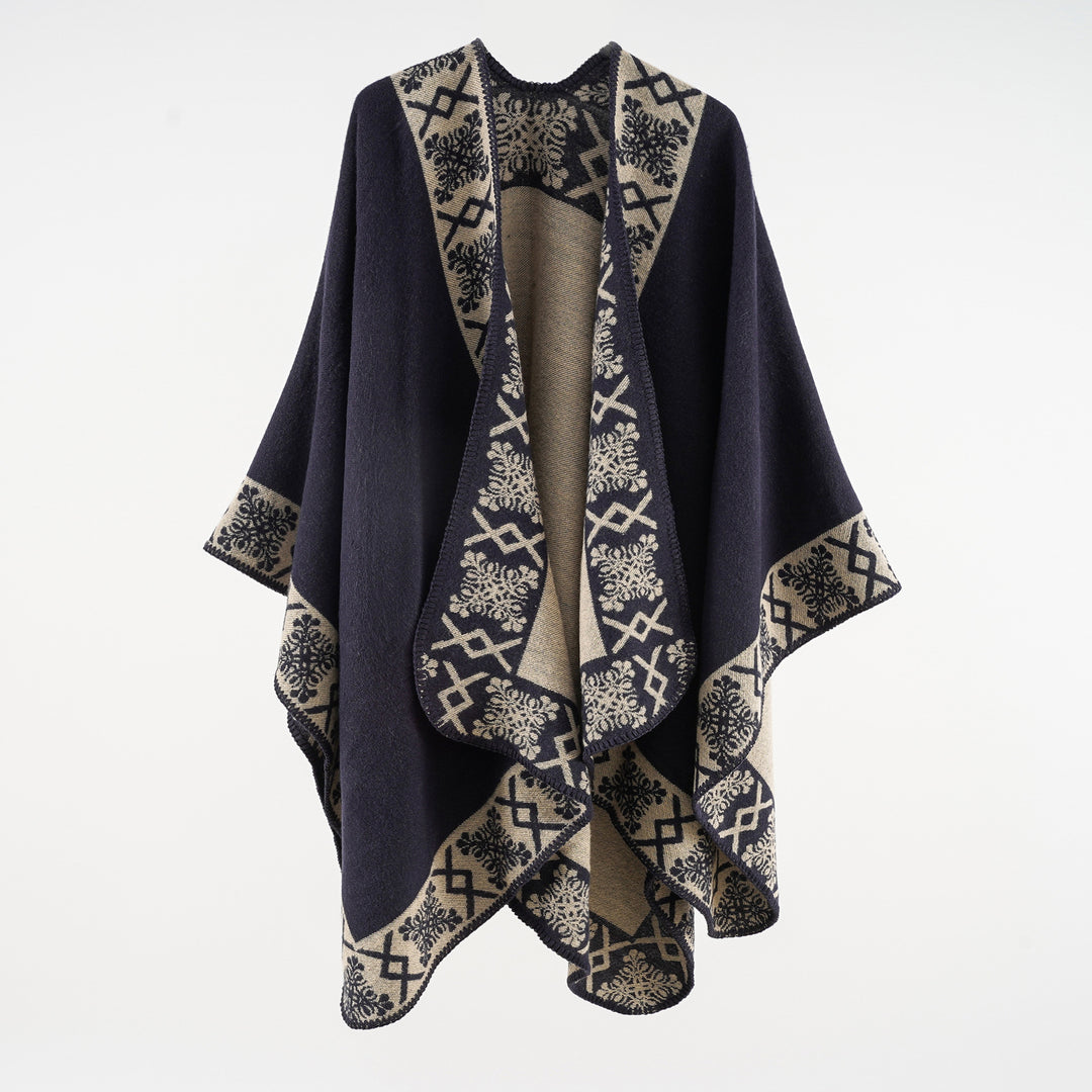 Women's oversized poncho cape made of wool blend with woven border jacquard and decorative chain stitch