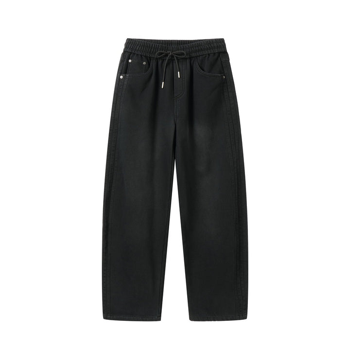 Women's wide high-waisted jeans with elastic waistband, drawstring, and decorative seams Mune Fashion
