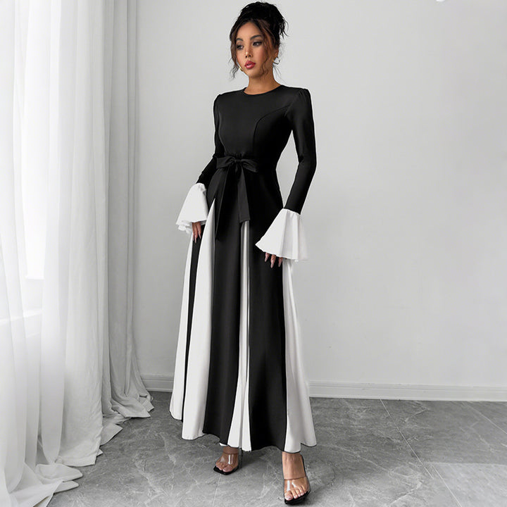 Ladies evening dress with fitted corset top, long sleeves and contrasting flounce cuffs Mune Fashion