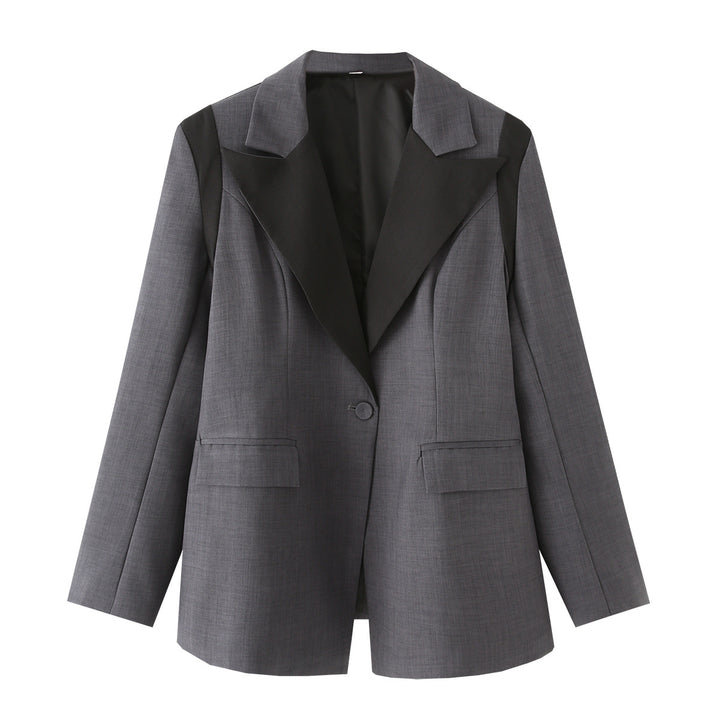 Women's oversized blazer with contrasting lapel, single-button placket, and flap pockets Mune Fashion