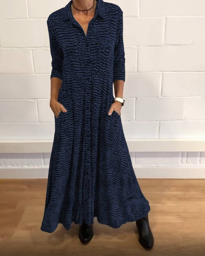 Ladies' flowing maxi dress with shirt collar, half-length sleeves, and side pockets Mune Fashion