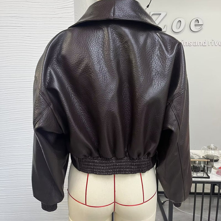 Women Faux Leather Bomber Jacket with High Stand Collar, Asymmetrical Closure and Elastic Hem Mune Fashion